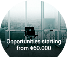 Luxury office chair overlooking a city skyline, highlighting executive job opportunities starting from € 60,000.